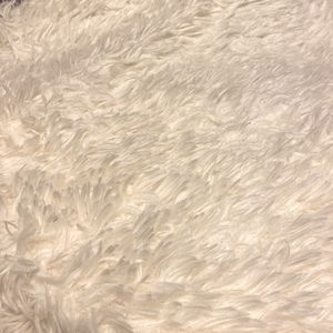 Fuzzy faux fur blanket in white